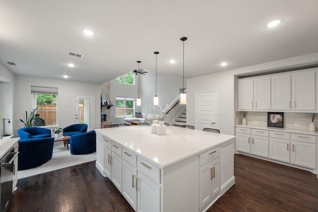 3603 High Dr, Grapevine, TX 76051 - kitchen featuring open floor plan, ceiling fan, dark wood-style flooring, recessed lighting, and white cabinets