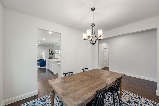 3603 High Dr, Grapevine, TX 76051 - dining area featuring a chandelier and dark wood-type flooring