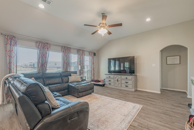 656 Bunk House Dr, Venus, TX 76084 - living area with a ceiling fan, light wood-style flooring, vaulted ceiling, and arched walkways
