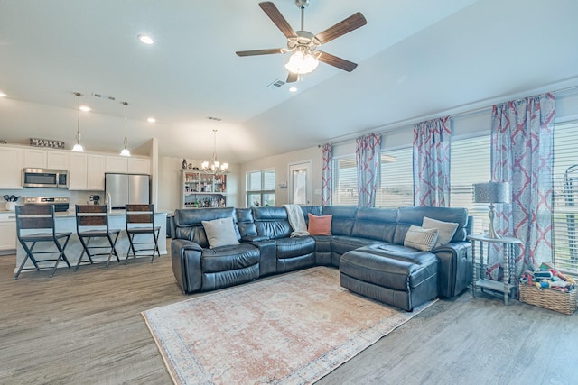 656 Bunk House Dr, Venus, TX 76084 - living room with light wood-style flooring, a chandelier, ceiling fan, lofted ceiling, and recessed lighting