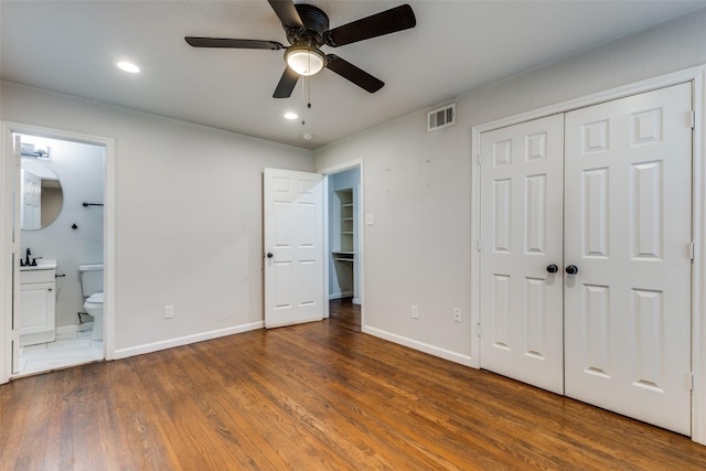 3641 La Prada Dr, Mesquite, TX 75150 - unfurnished bedroom with wood finished floors, ensuite bath, recessed lighting, a closet, and ceiling fan