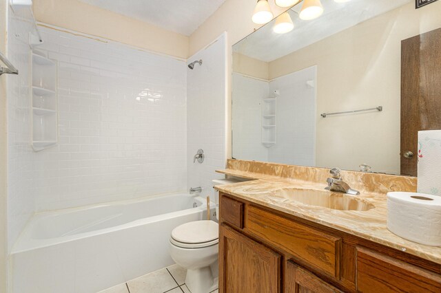 2114 Norway Dr, Garland, TX 75040 - bathroom with vanity, tile patterned floors, and bathtub / shower combination