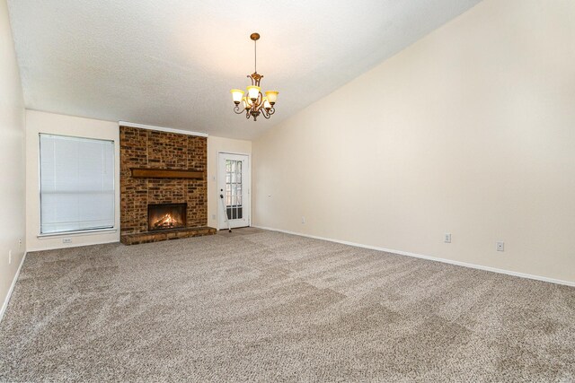 2114 Norway Dr, Garland, TX 75040 - unfurnished living room featuring a chandelier, carpet flooring, lofted ceiling, and a fireplace