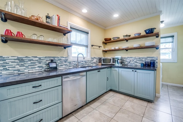 6201 Reiger Ave, Dallas, TX 75214 - kitchen featuring stainless steel appliances, open shelves, crown molding, dark countertops, and plenty of natural light