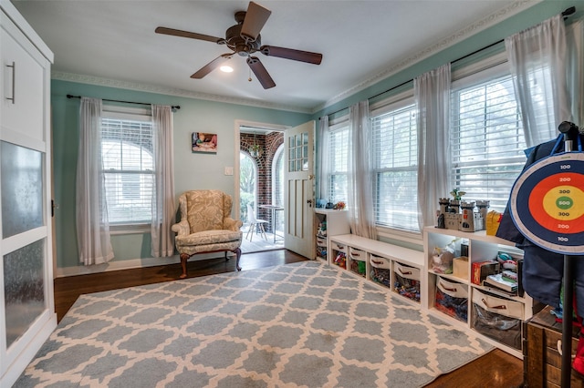 6201 Reiger Ave, Dallas, TX 75214 - sitting room featuring healthy amount of natural light, a ceiling fan, wood finished floors, and crown molding