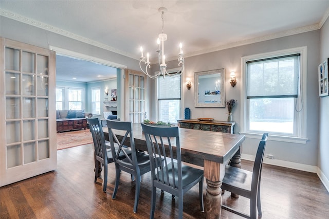 6201 Reiger Ave, Dallas, TX 75214 - dining room featuring a chandelier, ornamental molding, and dark wood-type flooring