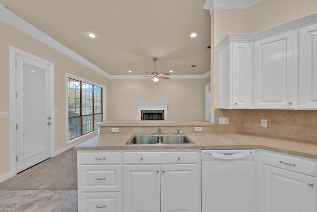 9841 Freedoms Way, Keithville, LA 71047 - kitchen featuring white dishwasher, ceiling fan, light countertops, a peninsula, and white cabinetry