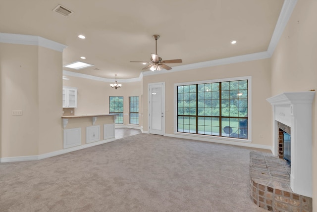 9841 Freedoms Way, Keithville, LA 71047 - unfurnished living room featuring ornamental molding, carpet, a fireplace, a ceiling fan, and a chandelier