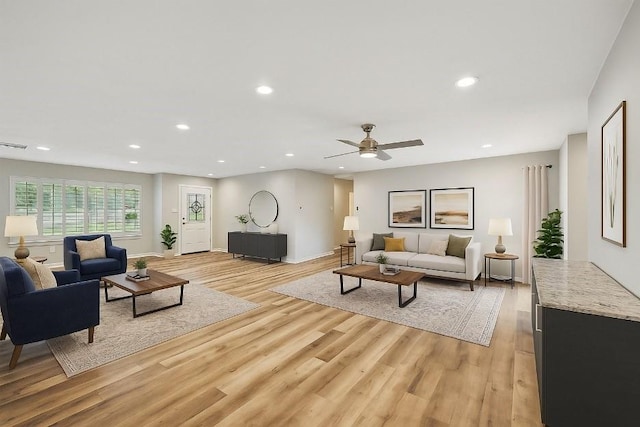 8434 Sweetwood Dr, Dallas, TX 75228 - living area featuring light wood-style flooring, recessed lighting, and a ceiling fan