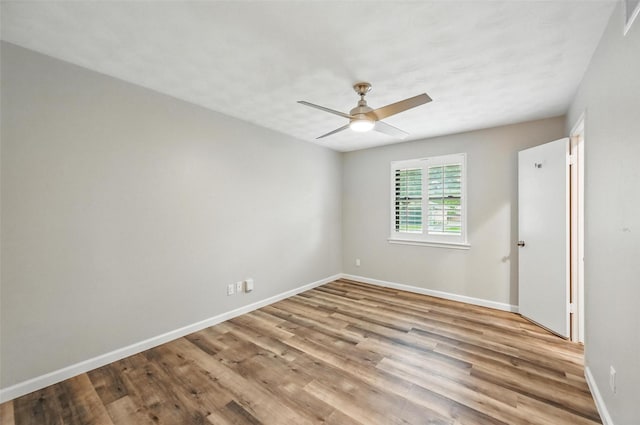 8434 Sweetwood Dr, Dallas, TX 75228 - unfurnished room with a ceiling fan and wood finished floors