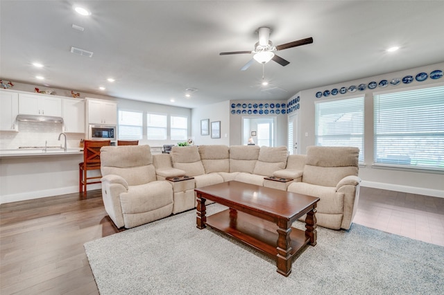 309 Savannah Ln, Oak Point, TX 75068 - living area with ceiling fan, recessed lighting, and light wood-type flooring