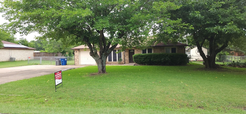 414 Butterfly Ln, Red Oak, TX 75154 - view of front of property with driveway, brick siding, and an attached garage