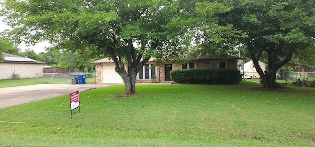 414 Butterfly Ln, Red Oak, TX 75154 - view of front of property with driveway, brick siding, and an attached garage