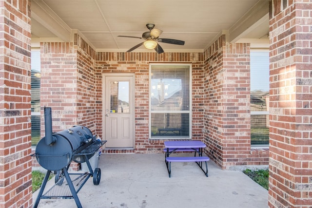 1102 Fairhaven Dr, Glenn Heights, TX 75154 - doorway to property with brick siding, a ceiling fan, and a patio
