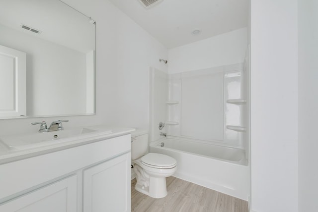 1961 Kiwi Dr, Royse City, TX 75189 - bathroom with vanity, washtub / shower combination, and wood finished floors