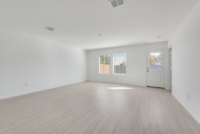 1961 Kiwi Dr, Royse City, TX 75189 - empty room featuring healthy amount of natural light and light wood-type flooring