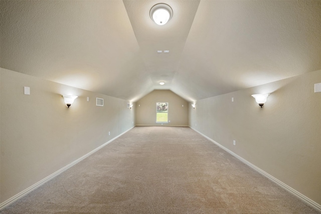 5048 Exposition Way, Fort Worth, TX 76244 - additional living space featuring lofted ceiling and light carpet