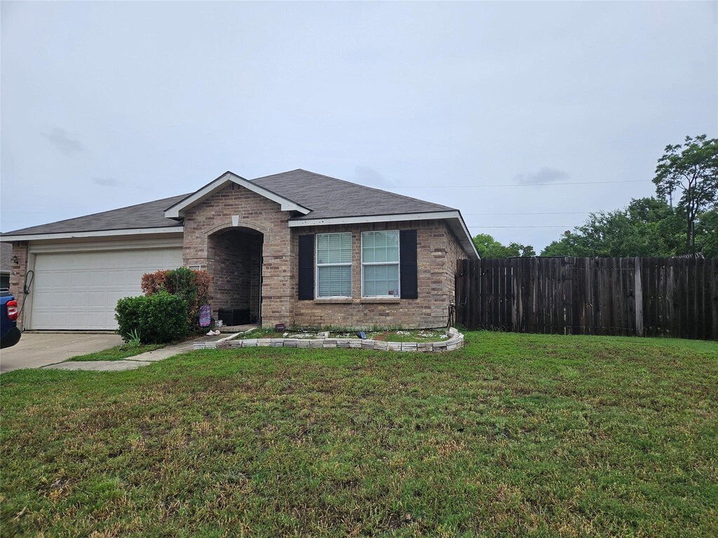 2901 Saddle Dr, Denton, TX 76210 - ranch-style house with a garage, concrete driveway, and brick siding