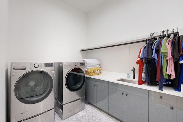 3828 Eaton Dr, Dallas, TX 75220 - laundry area featuring independent washer and dryer and cabinet space