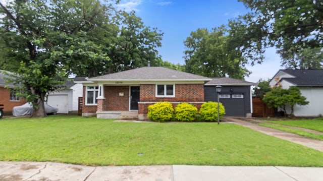 10150 Eastwood Dr, Dallas, TX 75228 - view of front facade featuring a garage, a front yard, brick siding, and concrete driveway