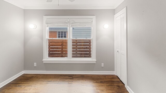 10150 Eastwood Dr, Dallas, TX 75228 - empty room featuring crown molding, dark wood-style floors, and a ceiling fan