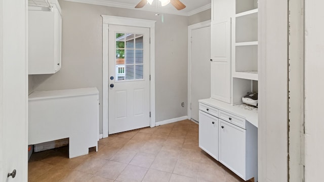 10150 Eastwood Dr, Dallas, TX 75228 - laundry area with crown molding, ceiling fan, and light tile patterned floors