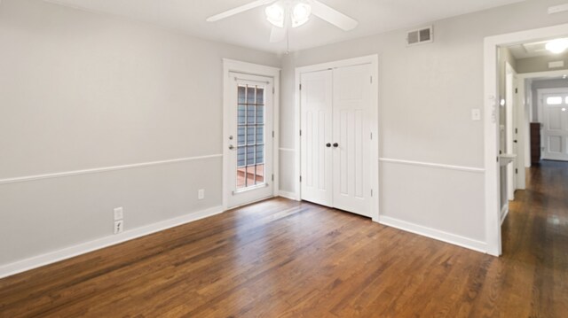 10150 Eastwood Dr, Dallas, TX 75228 - unfurnished bedroom featuring wood finished floors, a ceiling fan, a closet, and access to exterior