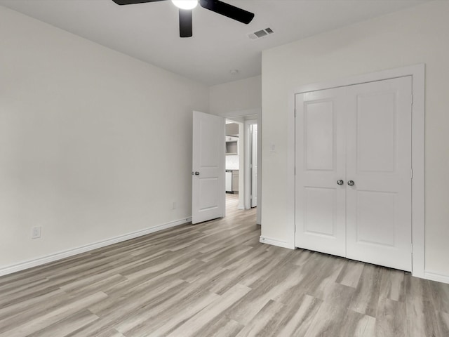 3526 Elsie Faye Heggins St, Dallas, TX 75210 - unfurnished bedroom featuring light wood-type flooring, a closet, and a ceiling fan