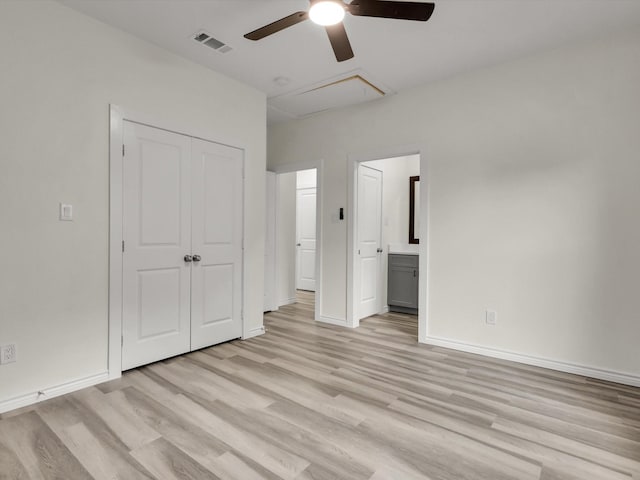 3526 Elsie Faye Heggins St, Dallas, TX 75210 - unfurnished bedroom featuring light wood-type flooring, a closet, ensuite bathroom, and a ceiling fan