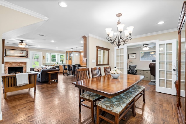 8928 Aldwick Cir, Dallas, TX 75238 - dining space featuring ceiling fan, ornamental molding, recessed lighting, wood finished floors, and a chandelier