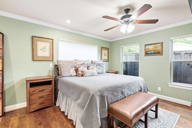 8928 Aldwick Cir, Dallas, TX 75238 - bedroom featuring ornamental molding, multiple windows, wood finished floors, ceiling fan, and recessed lighting
