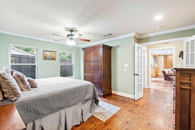 8928 Aldwick Cir, Dallas, TX 75238 - bedroom with light wood finished floors, ornamental molding, a ceiling fan, and recessed lighting