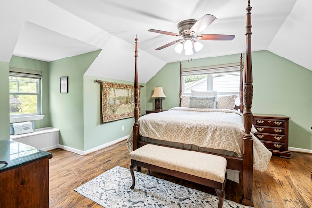 8928 Aldwick Cir, Dallas, TX 75238 - bedroom with lofted ceiling, multiple windows, wood finished floors, and a ceiling fan