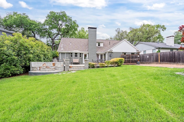 8928 Aldwick Cir, Dallas, TX 75238 - back of house featuring a patio area, a chimney, and roof with shingles