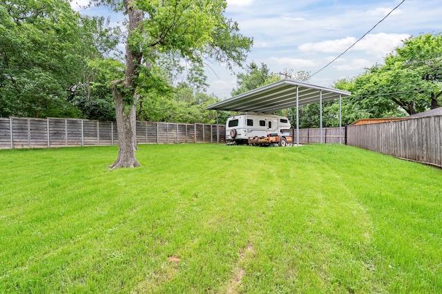 8928 Aldwick Cir, Dallas, TX 75238 - fenced backyard featuring a carport