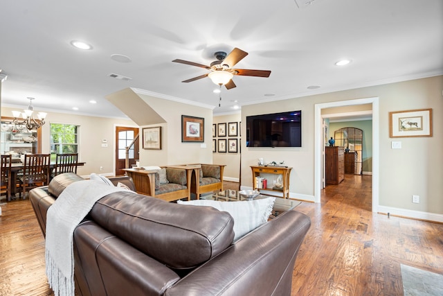 8928 Aldwick Cir, Dallas, TX 75238 - living area with a ceiling fan, ornamental molding, recessed lighting, a chandelier, and wood finished floors