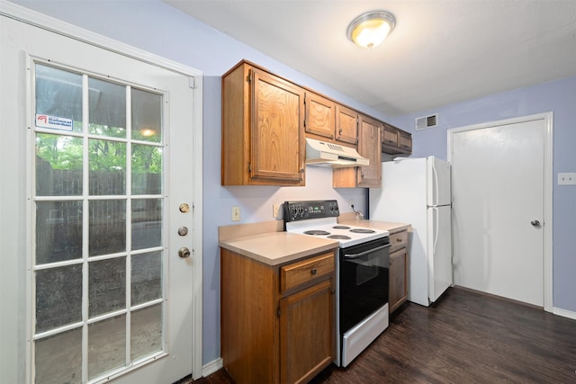 123 Austin Stone Dr, Duncanville, TX 75137 - kitchen featuring white appliances, under cabinet range hood, light countertops, dark wood-style flooring, and brown cabinetry