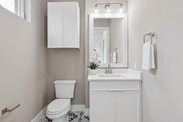 1000 W 10th St, Dallas, TX 75208 - half bath with vanity and tile patterned flooring