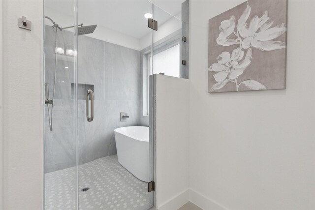 1000 W 10th St, Dallas, TX 75208 - full bathroom with a freestanding tub and a shower stall