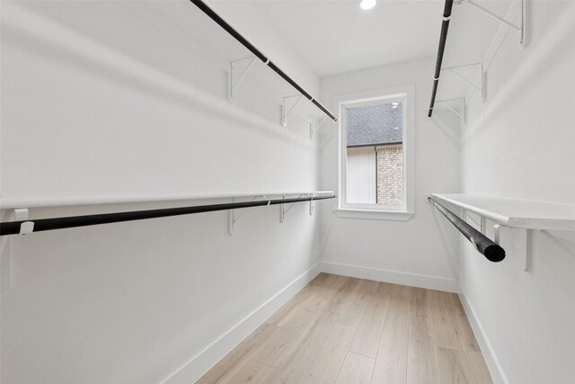 1000 W 10th St, Dallas, TX 75208 - spacious closet featuring light wood-style flooring