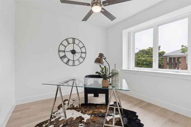 1000 W 10th St, Dallas, TX 75208 - home office with wood finished floors and ceiling fan