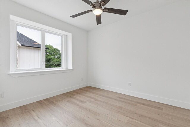 1000 W 10th St, Dallas, TX 75208 - unfurnished room featuring light wood-style flooring and a ceiling fan