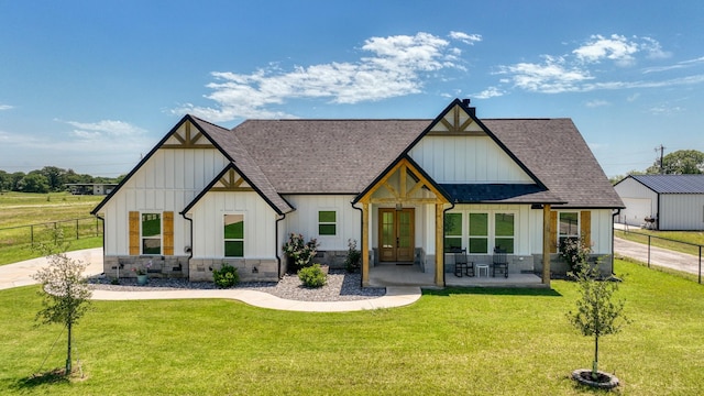 1401 County Road 1470, Chico, TX 76431 - modern farmhouse featuring a shingled roof, board and batten siding, and french doors
