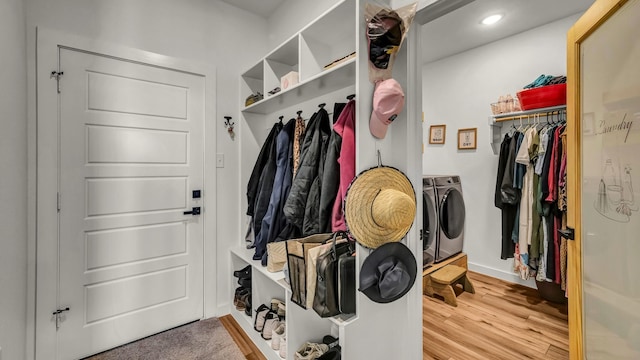1401 County Road 1470, Chico, TX 76431 - mudroom featuring washing machine and dryer, wood finished floors, and recessed lighting