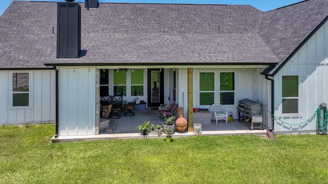 1401 County Road 1470, Chico, TX 76431 - back of house with board and batten siding, a shingled roof, and a patio