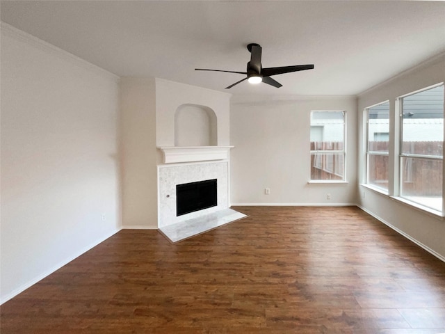 5413 Mohawk Ct, The Colony, TX 75056 - unfurnished living room with a ceiling fan, a fireplace, wood finished floors, and ornamental molding