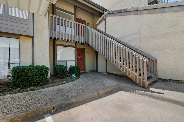 4555 N O Connor Rd Unit 2278, Irving, TX 75062 - doorway to property featuring stucco siding