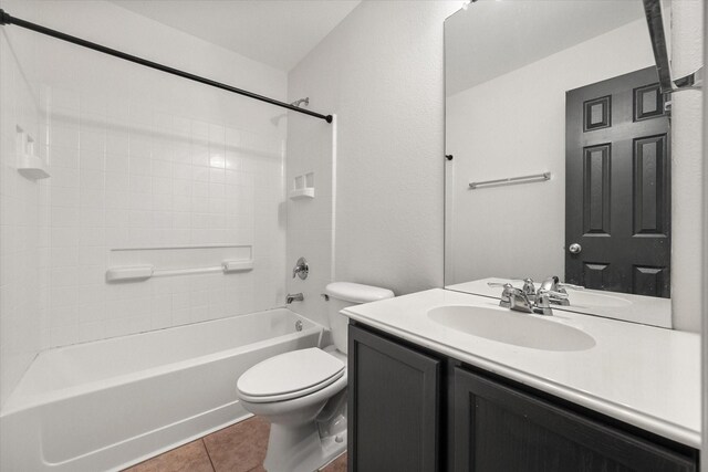 1003 Rosita St, Arlington, TX 76002 - full bath featuring tile patterned flooring, vanity, and bathtub / shower combination