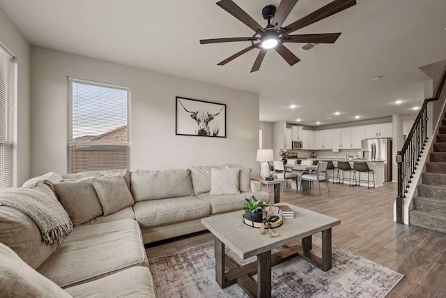 3018 Dakota Trl, Crandall, TX 75114 - living room featuring ceiling fan, stairs, recessed lighting, and dark wood-style flooring
