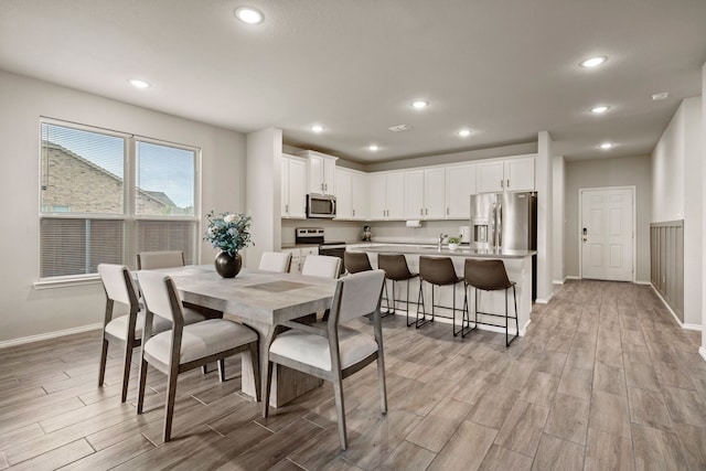 3018 Dakota Trl, Crandall, TX 75114 - dining area featuring light wood-type flooring and recessed lighting